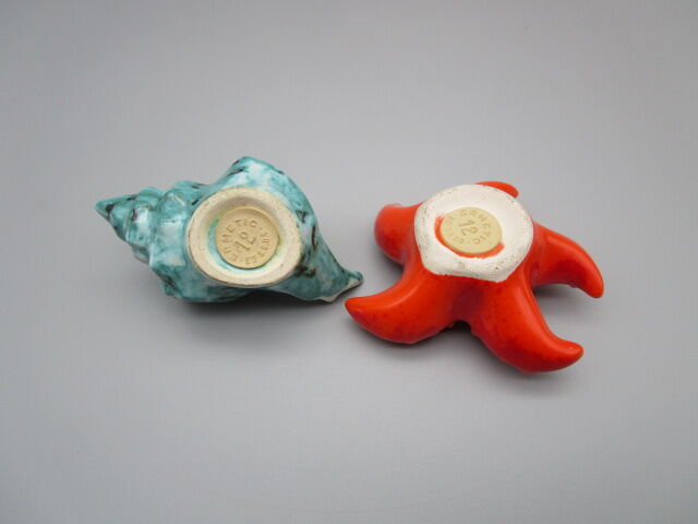 Pair of vintage ceramic salt shaker/pepper maker "starfish and shell"