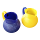 TWO VINTAGE YELLOW AND BLUE GLASS PITCHERS 1990