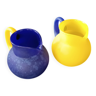 TWO VINTAGE YELLOW AND BLUE GLASS PITCHERS 1990