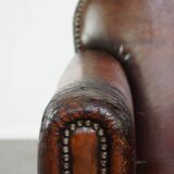 Characterful vintage design armchair made from beautifully patinated sheepskin