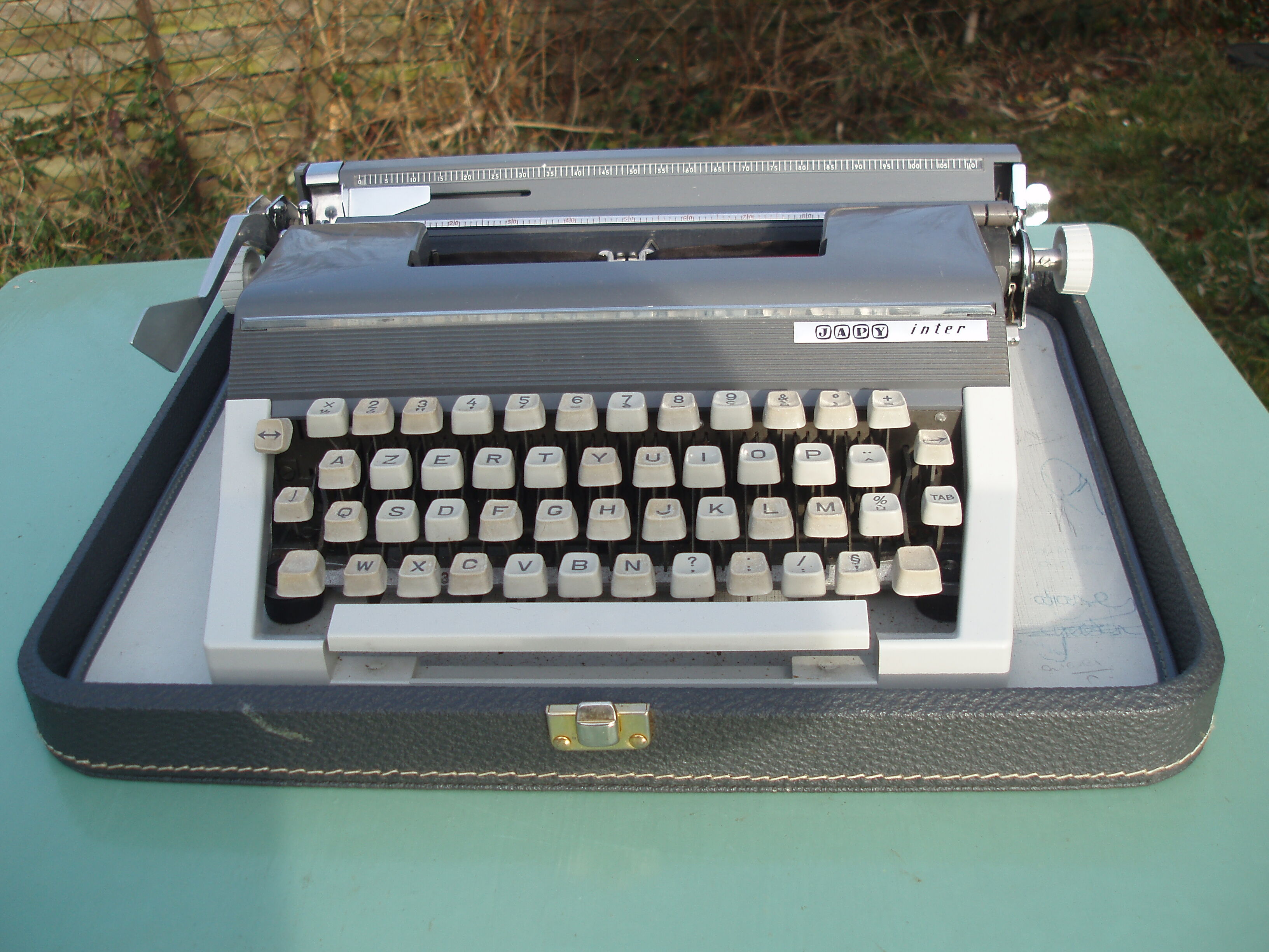 Typewriter in very good condition revised japy inter with his satchel