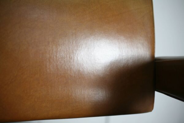Fauteuil style Jacques Adnet, circa 1955
