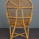 Rattan armchair with armrests by Rohé Noordwolde