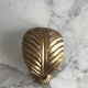 Gold metal leaf wall light