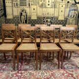 Suite de 9 chaises en cannage de style Empire - Consulat