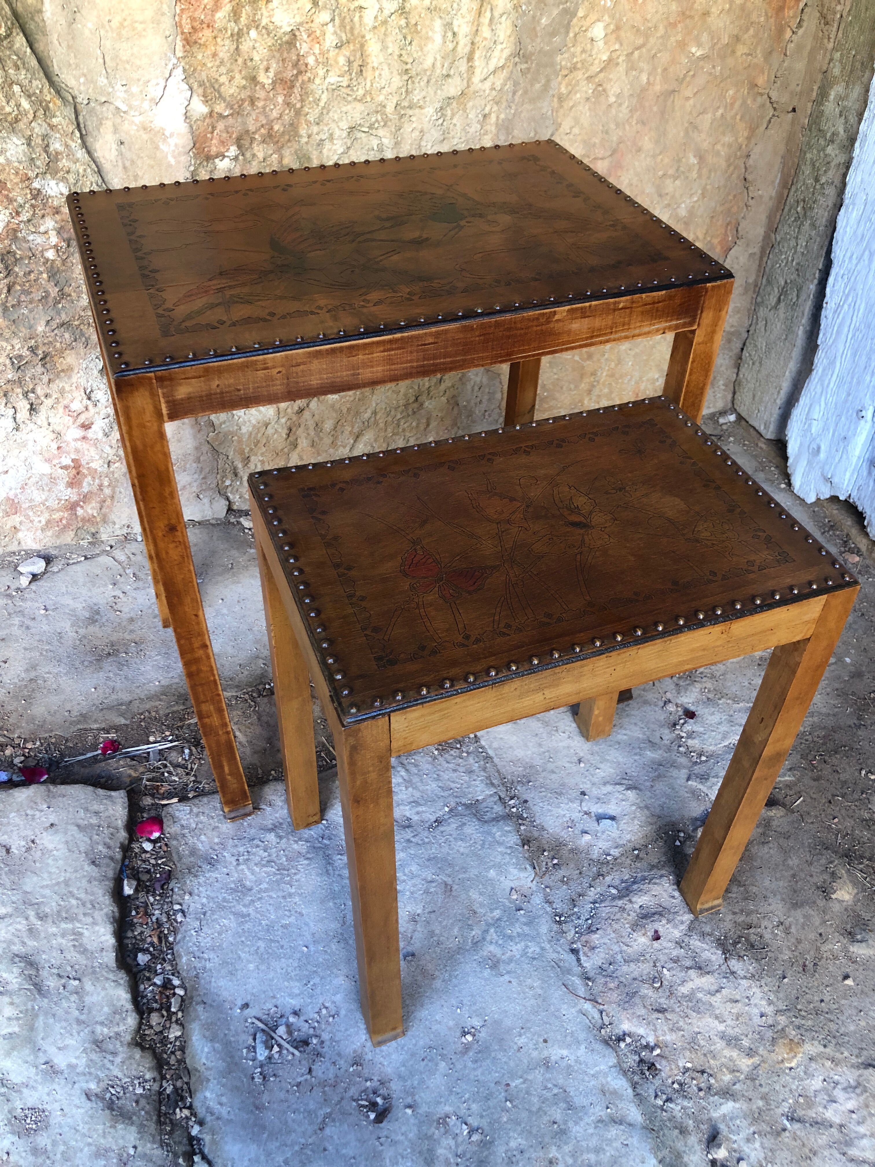 Pair of studded nesting tables from the 1930s.