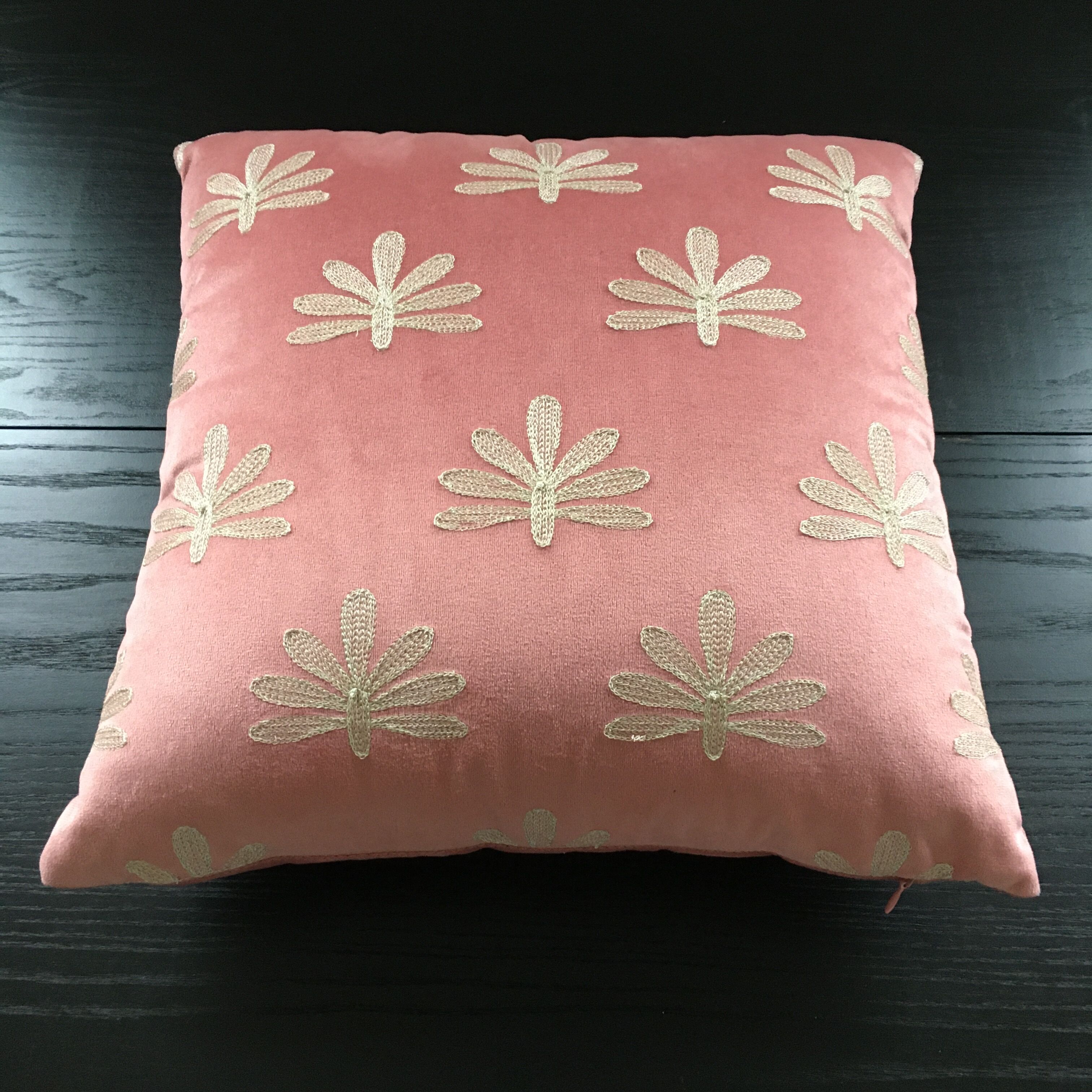 Pink cushion embroidered palm trees