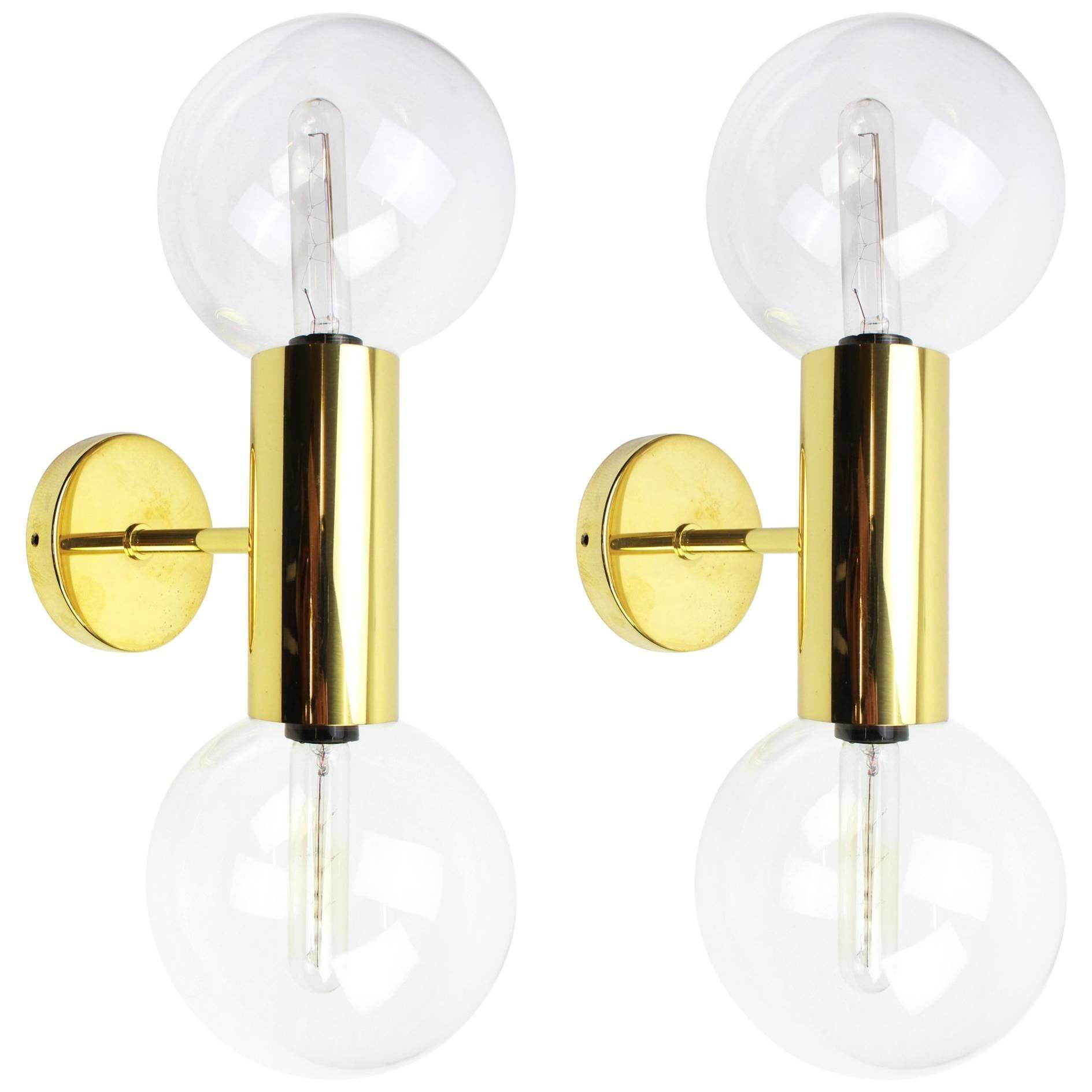 Pair of mid-century design wall lamps by Motoko Ishii for Staff, Germany, 1970s.