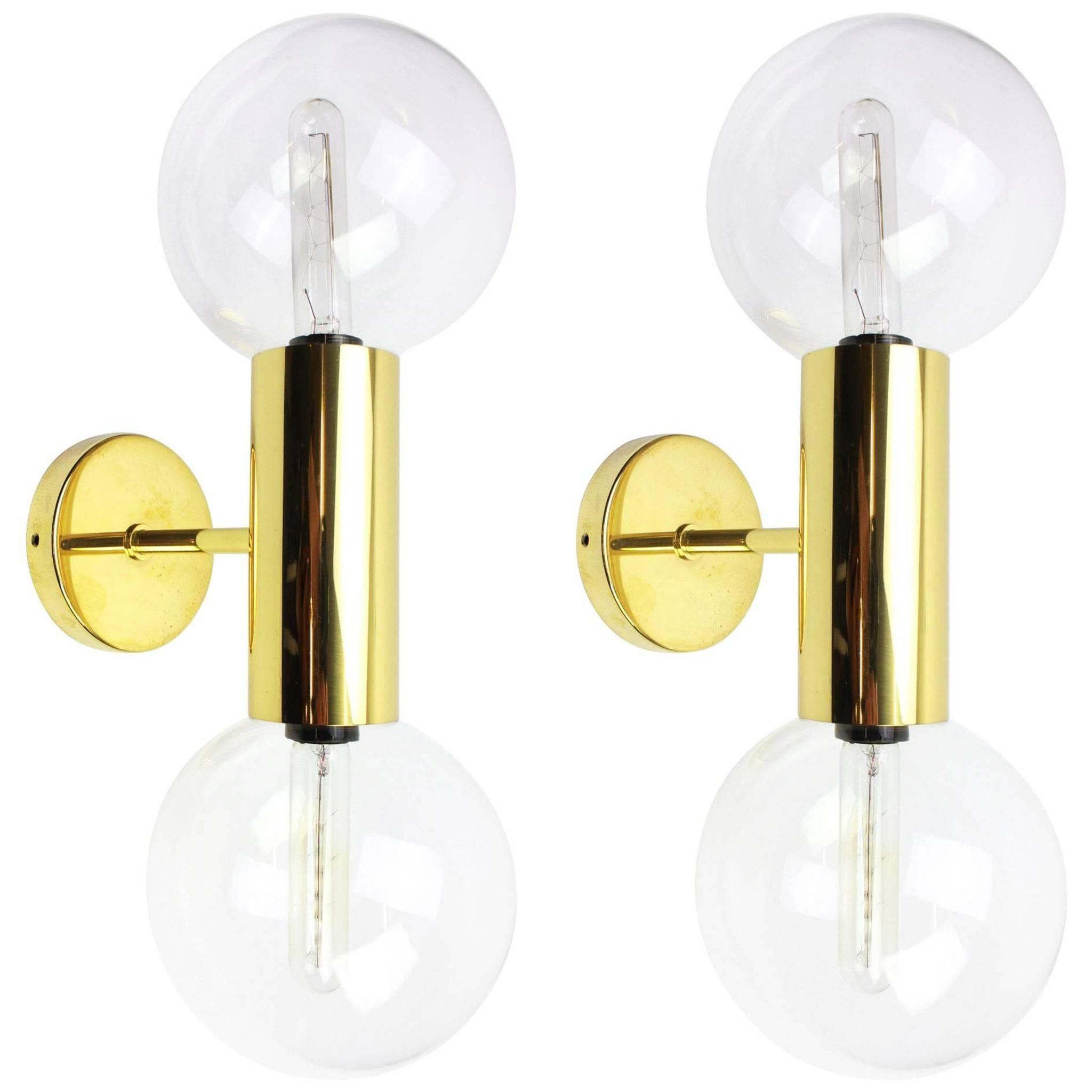 Pair of mid-century design wall lamps by Motoko Ishii for Staff, Germany, 1970s.