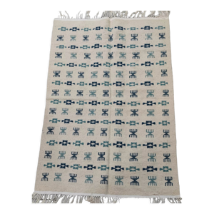 Tapis blanc et bleu tissé main