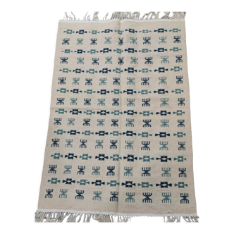 Tapis blanc et bleu tissé main en laine naturelle