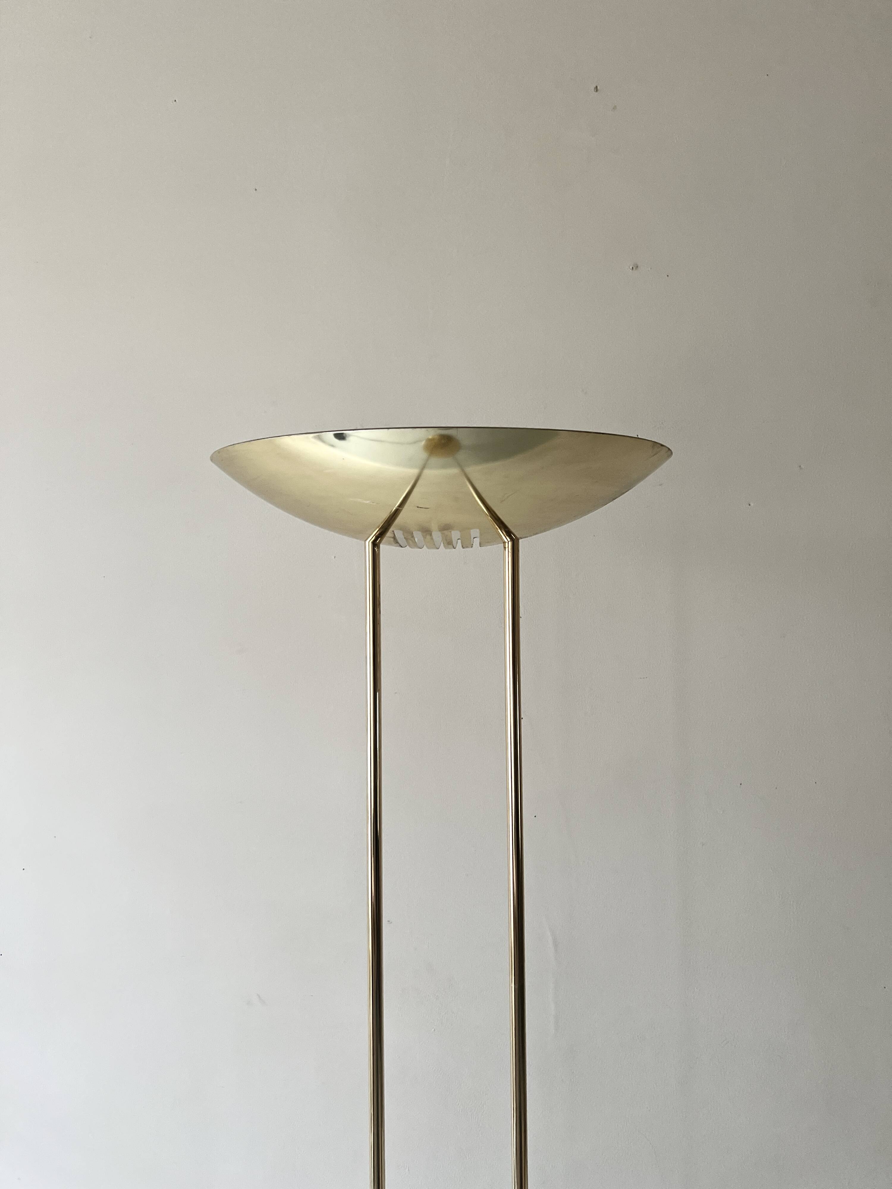 Modernist halogen floor lamp with a gold bowl, 1980.