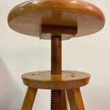 Adjustable and swivel wooden stool