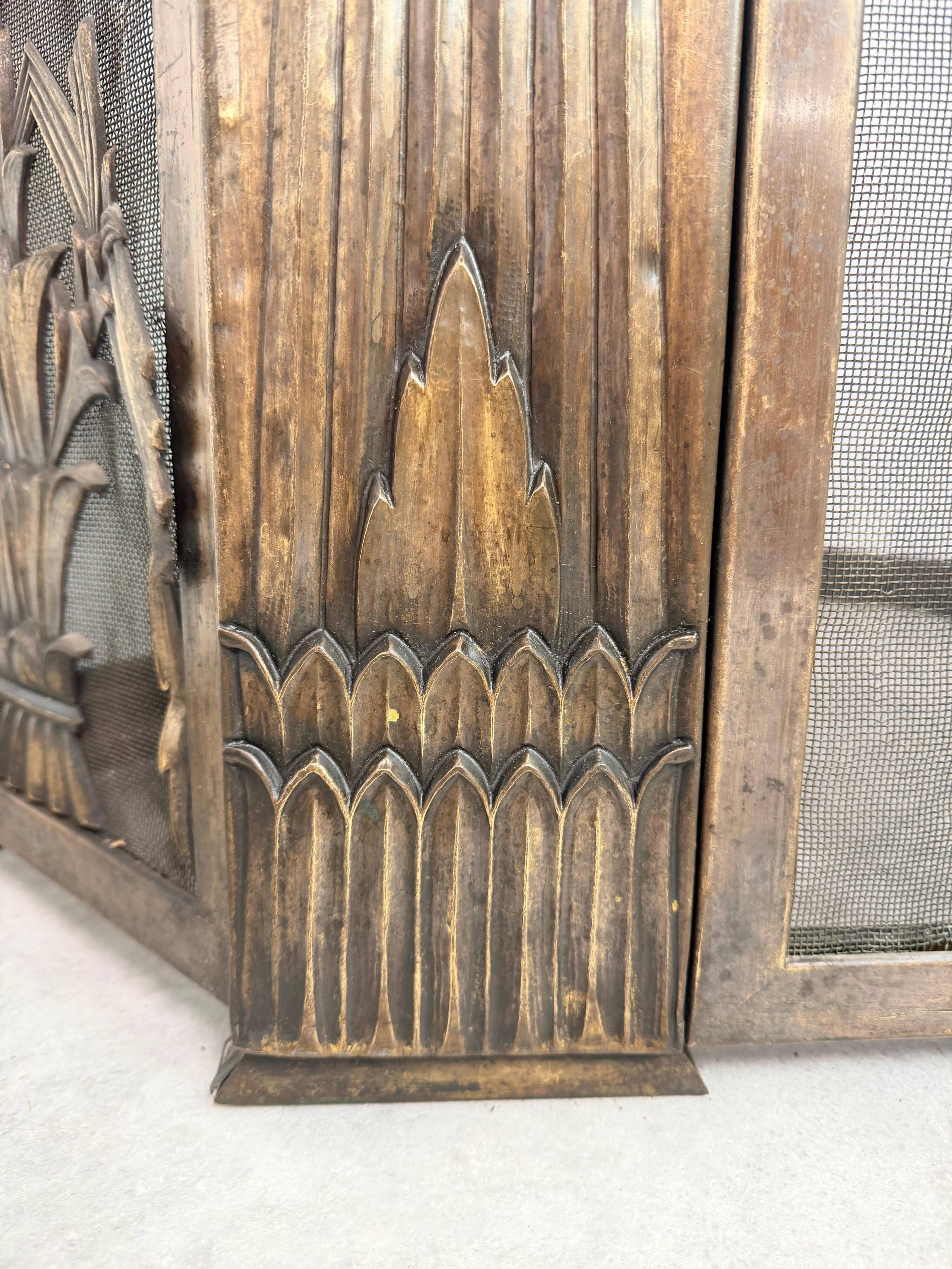 Corner fireplace screen in brass attributed to Dagobert Peche
