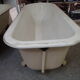 Cast iron island bathtub, on eagle-begged feet