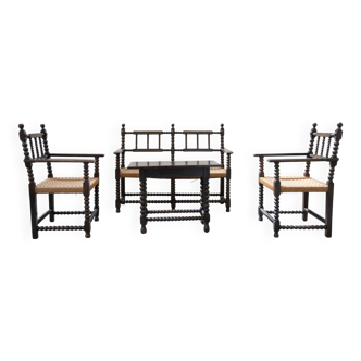 French sitting room cast in ebony and woven cane from the early 1900s