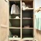 Renovated antique wardrobe – natural wood & sage green interior