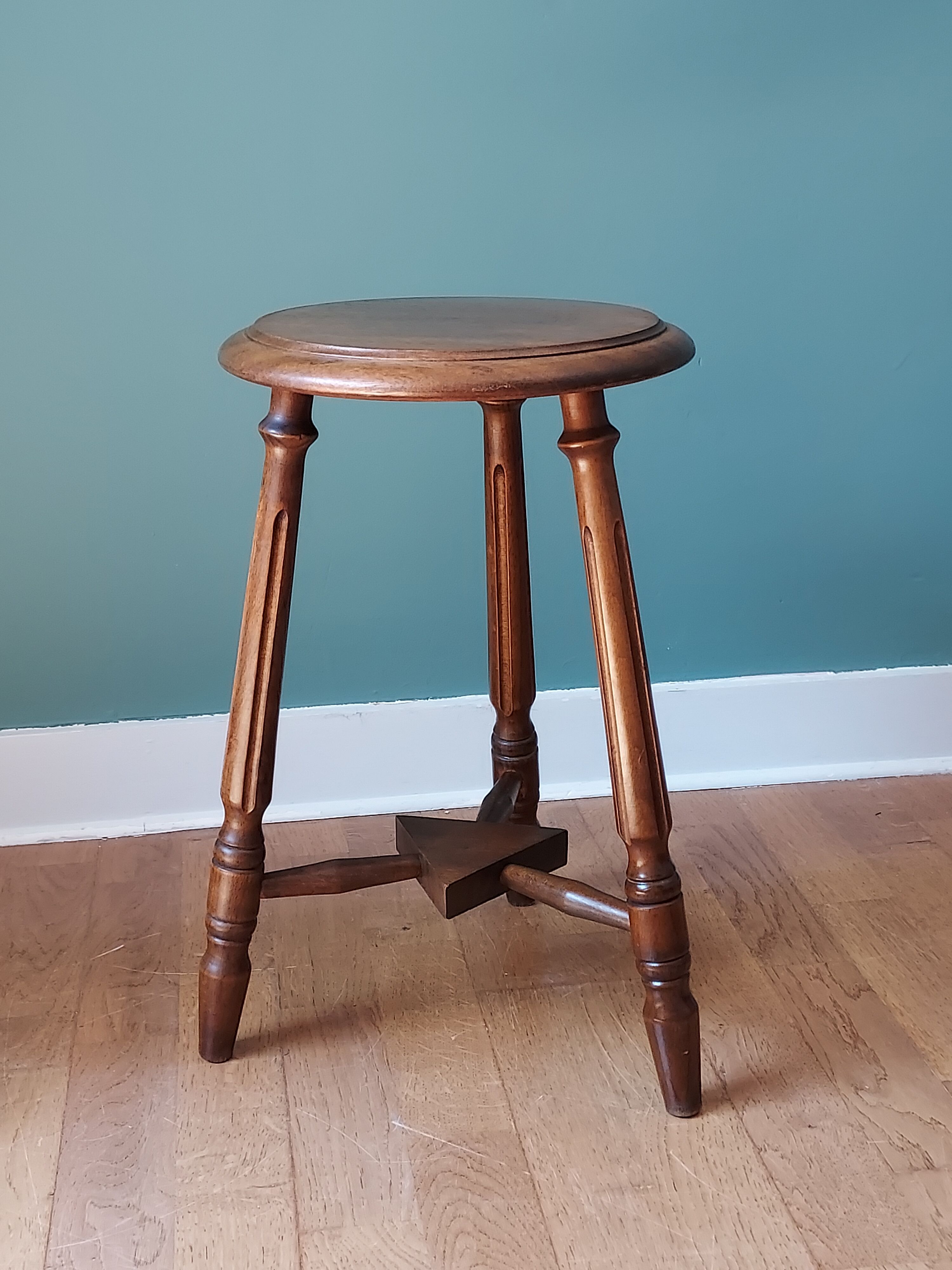 Carved tripod stool