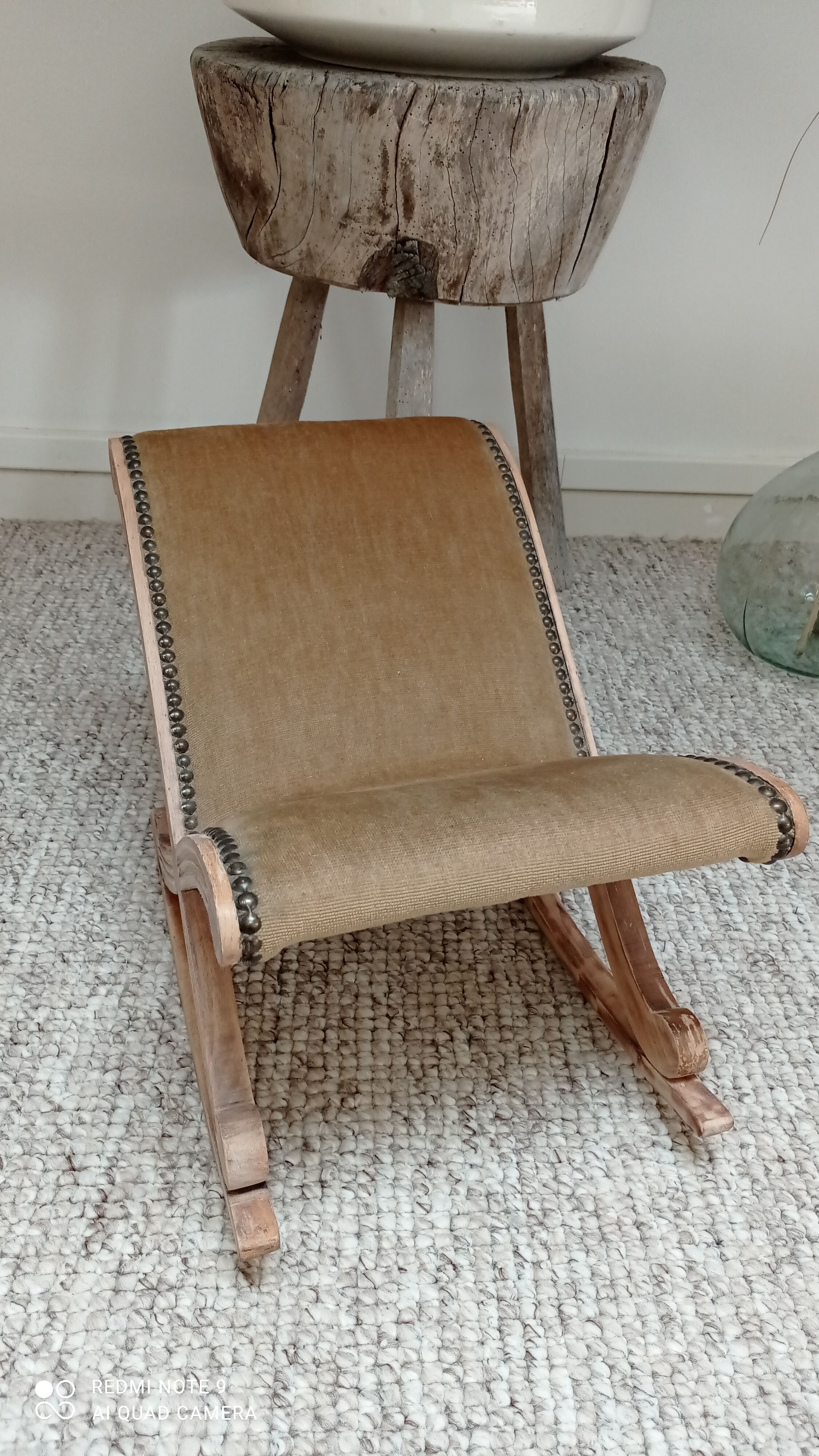 Footrest upholstered in wood