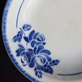 Antique shallow dish from Badonviller with blue flower decoration.