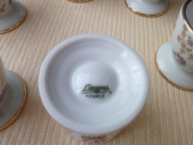 Set of 6 flowered shells in Limoges porcelain