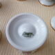 Set of 6 flowered shells in Limoges porcelain