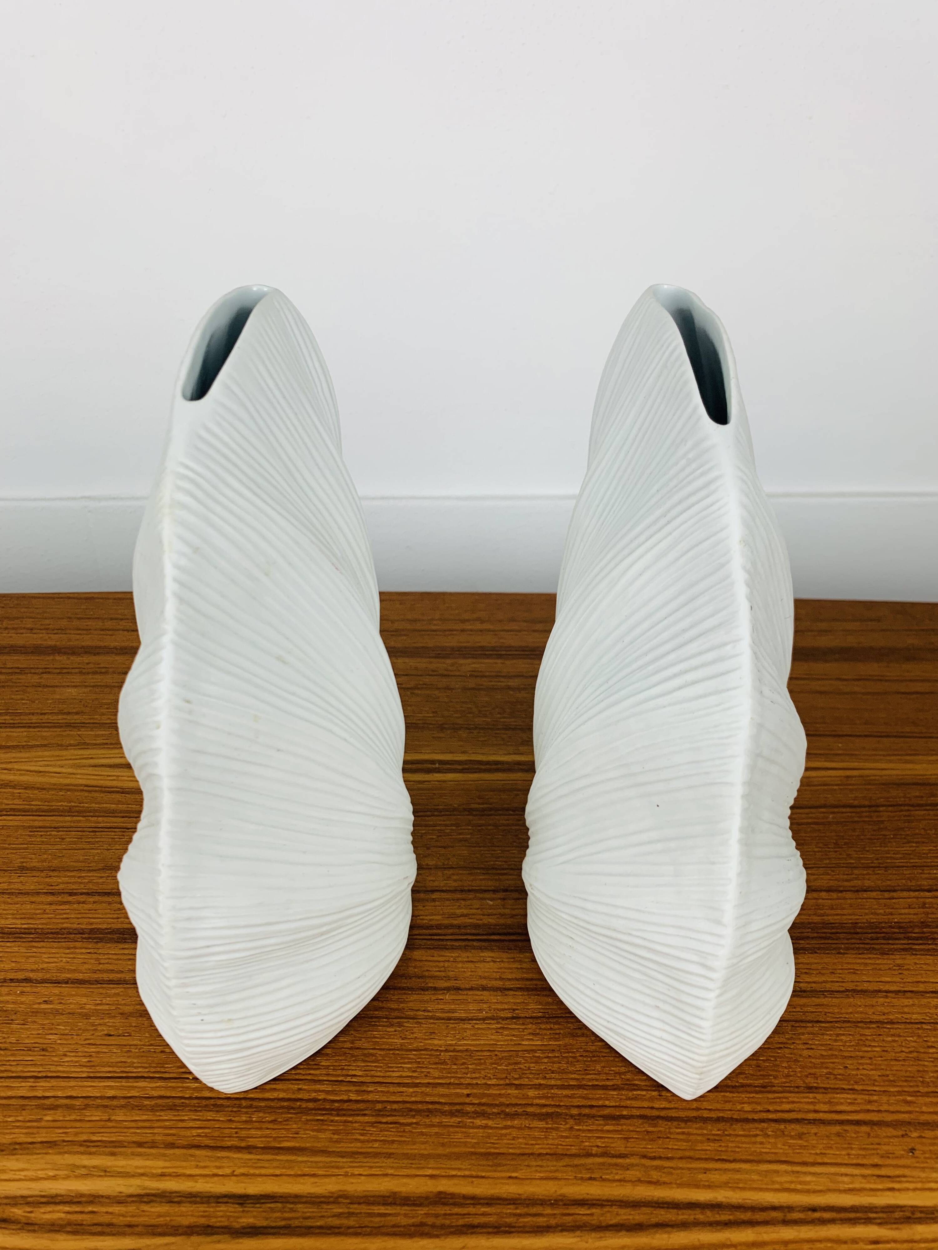Pair of white ceramic coral vases, bookends