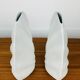 Pair of white ceramic coral vases, bookends