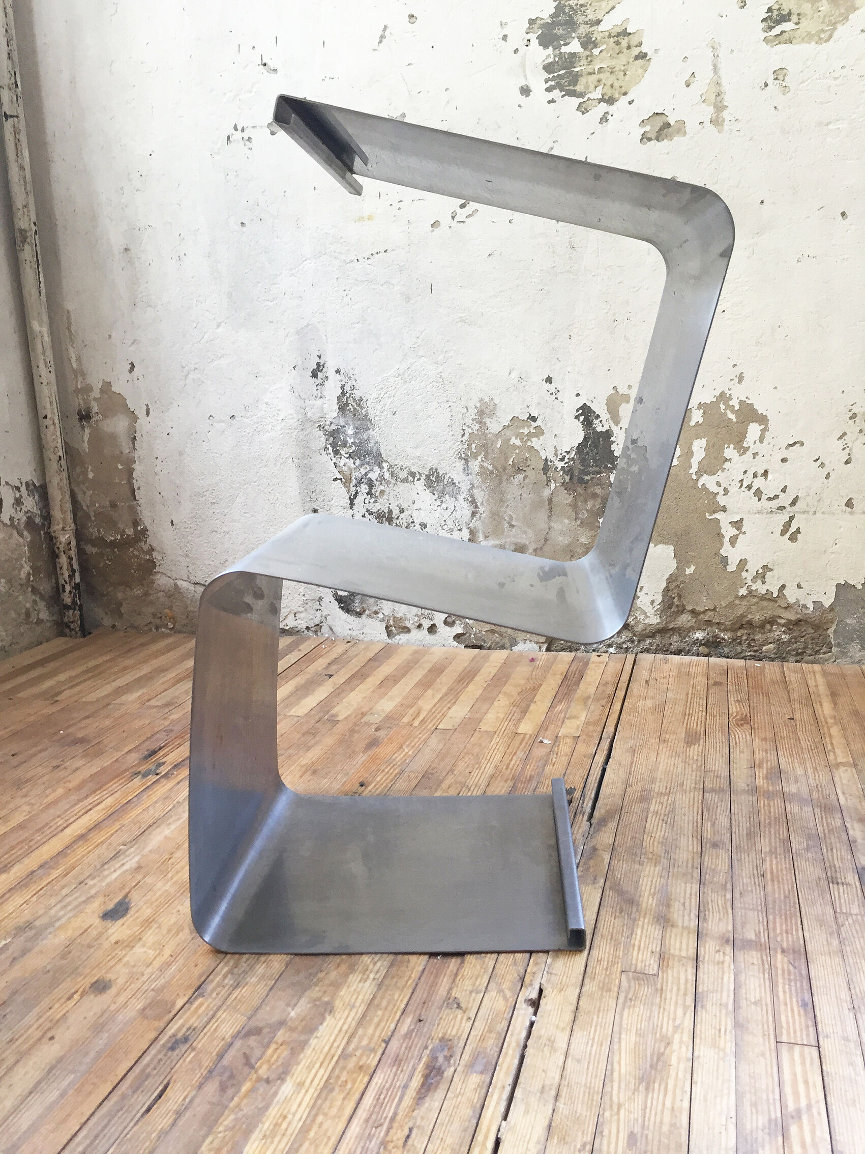 "Zig-zag" satin stainless steel shelf by Joelle Ferlande and François Monnet