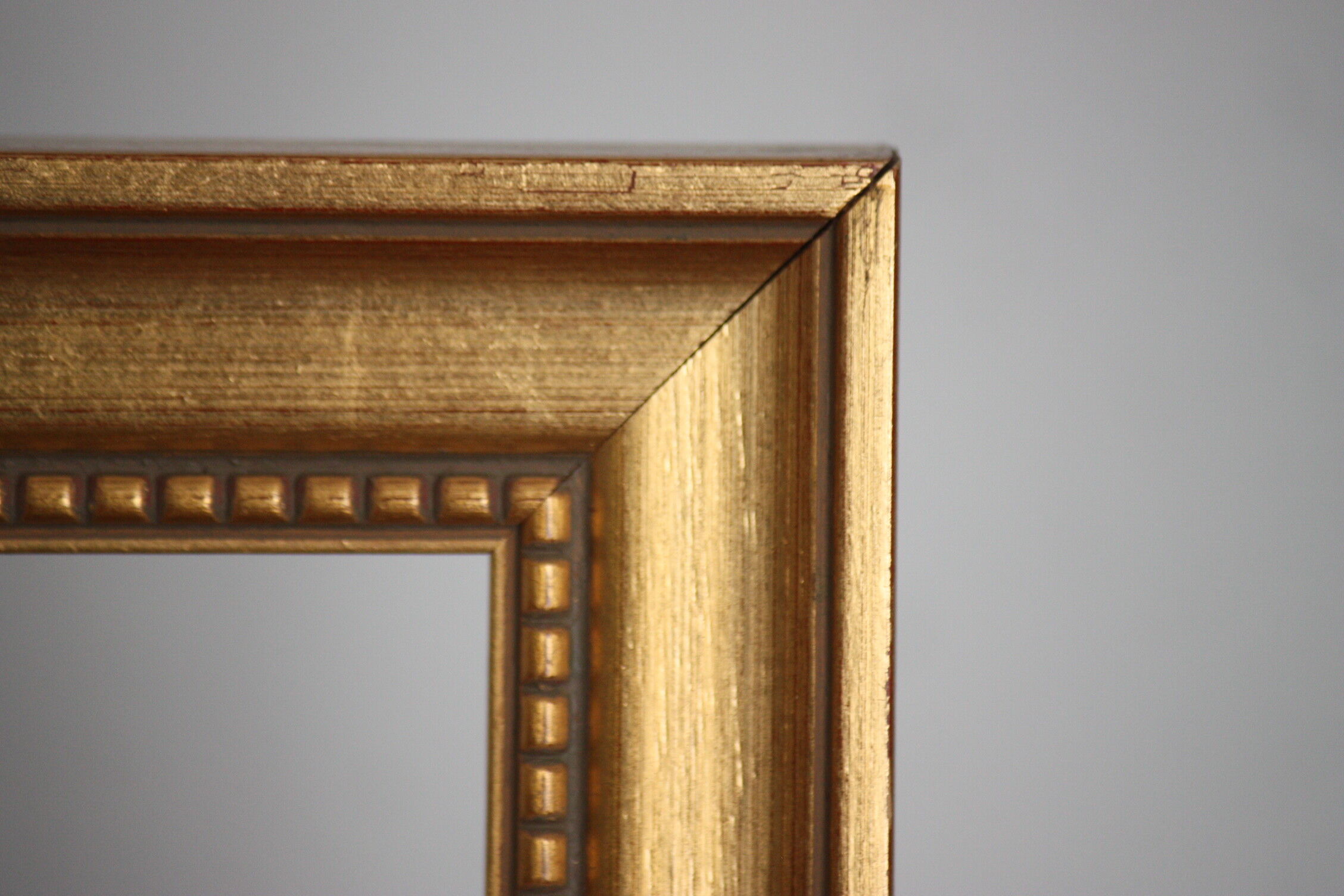 Carved and moulded gilded wood frame