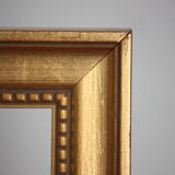 Carved and moulded gilded wood frame