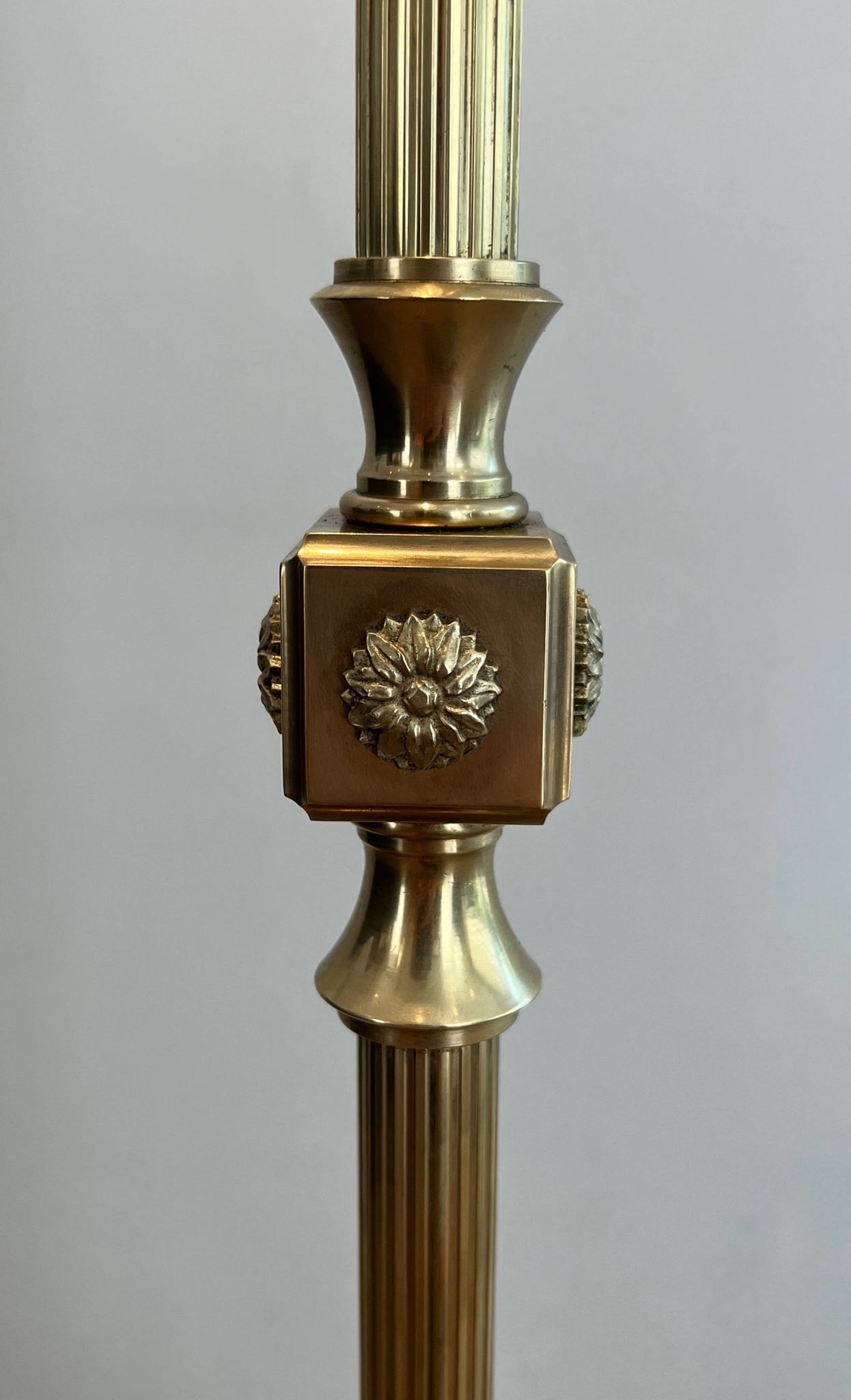 Neoclassical brass floor lamp with claw feet from Maison Jansen.