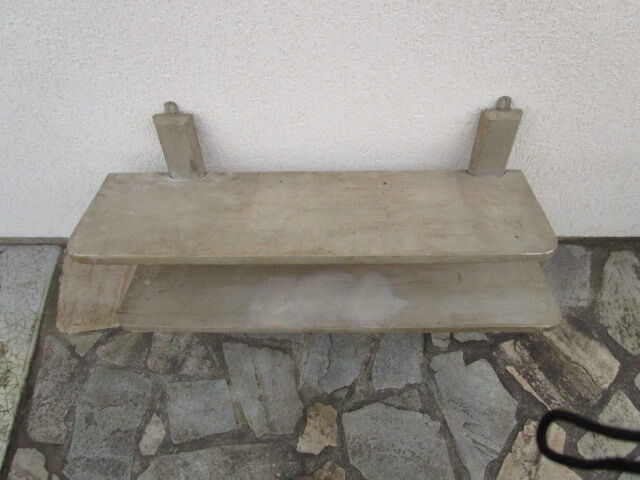 Old wall workshop shelf with coat rack