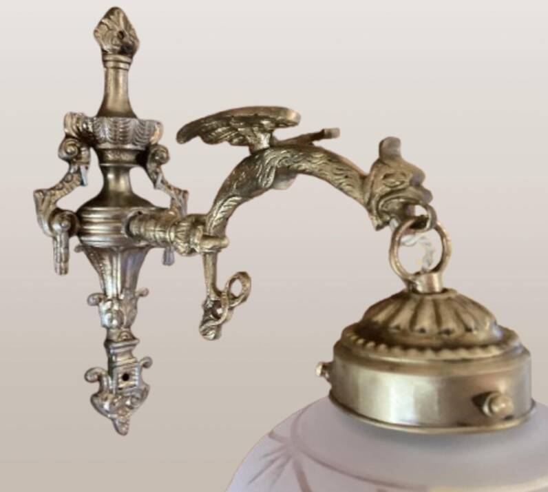 Set of 2 Empire style vintage wall sconces in the shape of a dragon from 1940-1950.