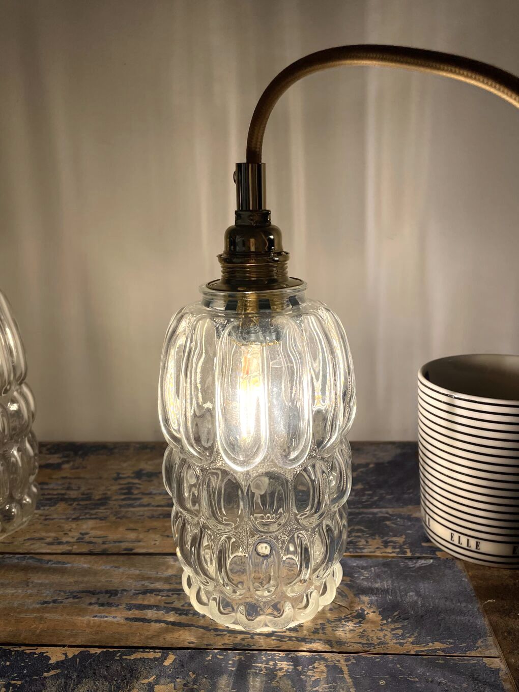 Set of two vintage electric chiseled glass walking lamps