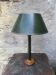 Vintage lamp in imitation green leather
