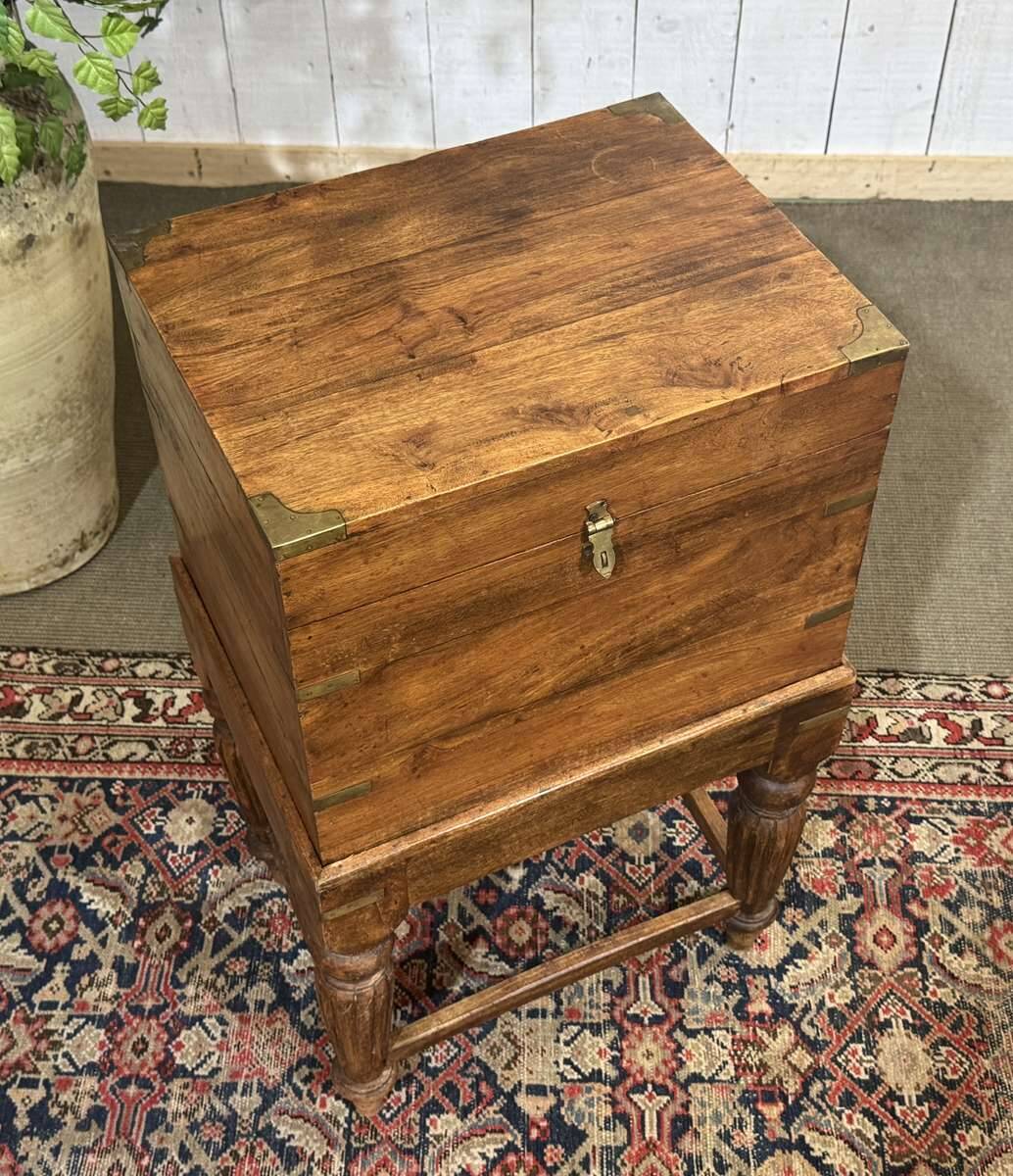 Teak bottle cabinet on legs in marine style