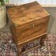 Teak bottle cabinet on legs in marine style
