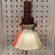 Scandinavian design wall light in teak and brass from the 1950s.