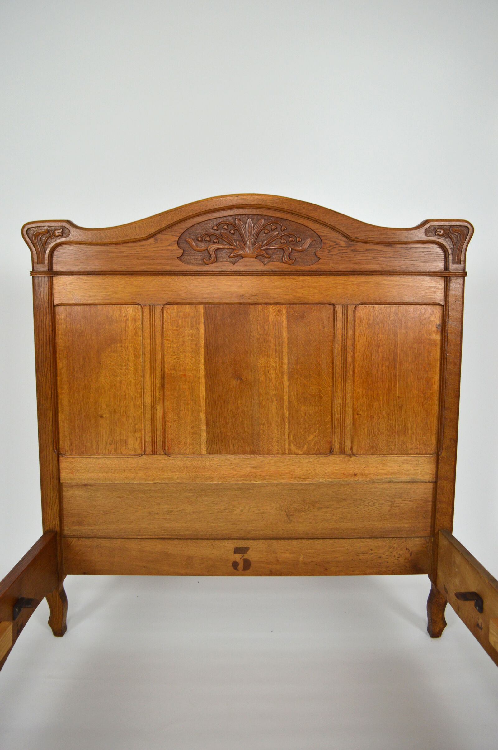 Art Nouveau twin beds in carved solid oak, France, circa 1910