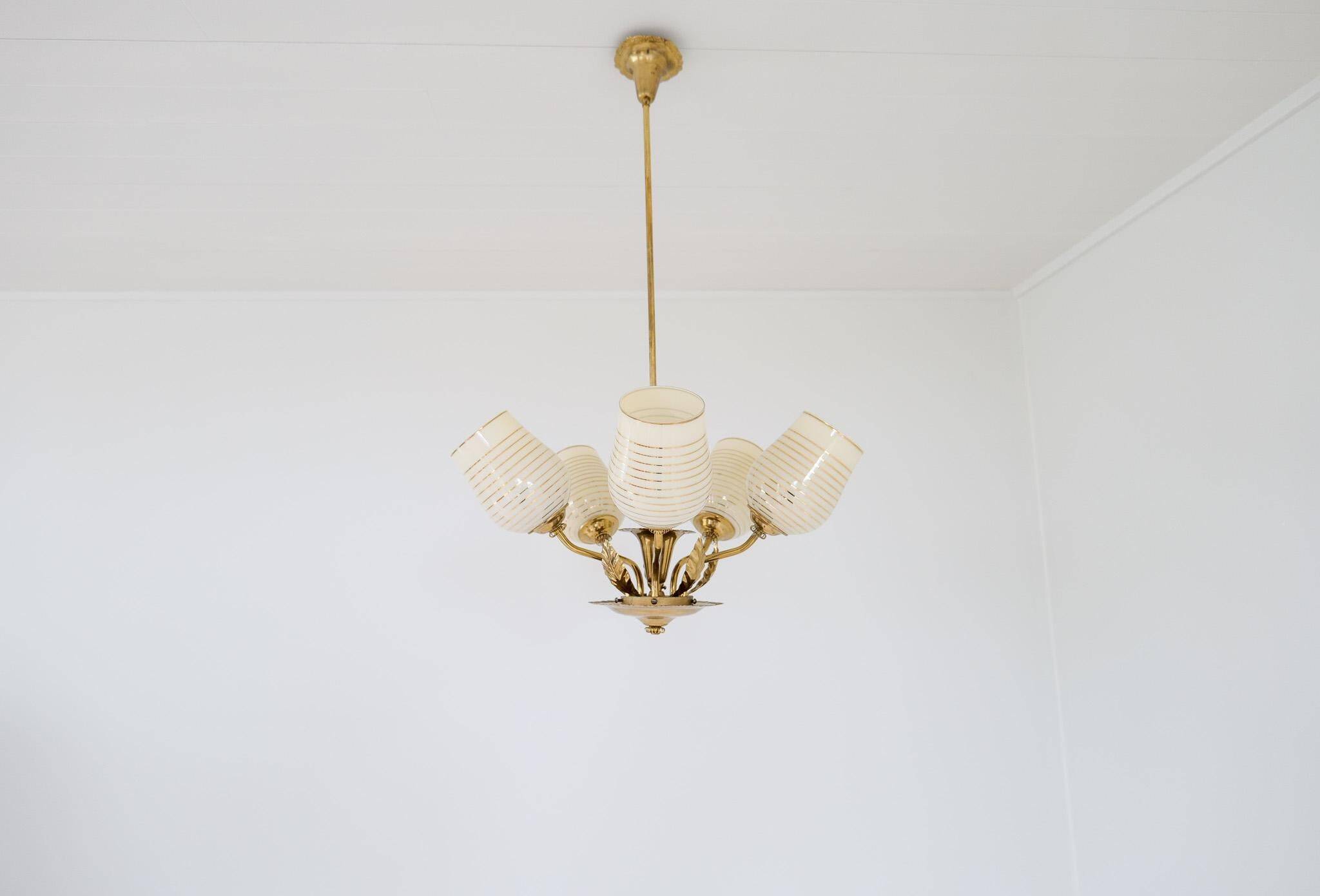 Mid-century brass and glass pendant light by Sario, Finland, 1950s.