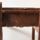 Antique armchair in walnut and studded leather, 17th century