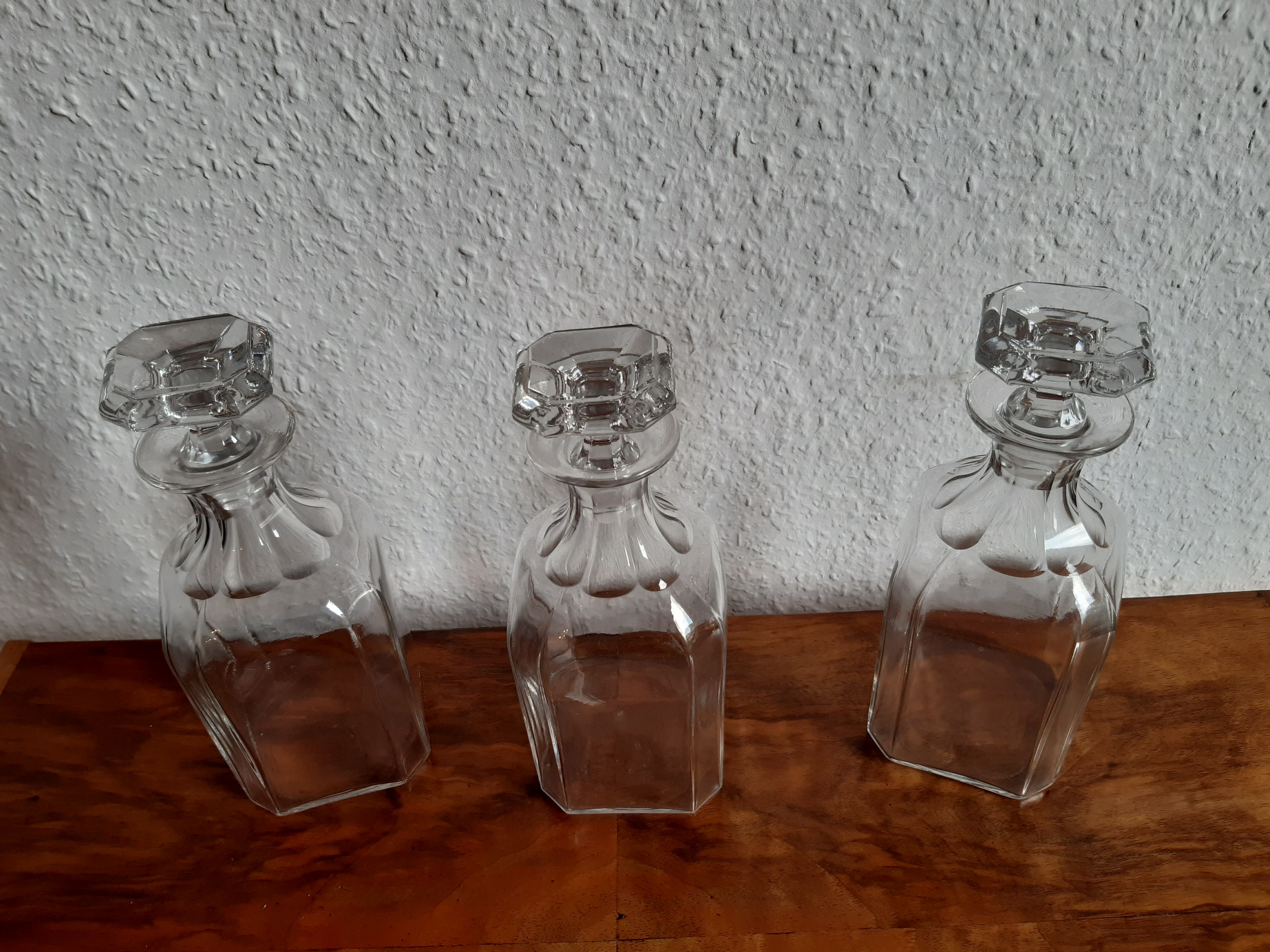 Old-fashioned glass liquor cellar and St Louis crystal decanters