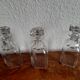 Old-fashioned glass liquor cellar and St Louis crystal decanters