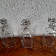 Old-fashioned glass liquor cellar and St Louis crystal decanters