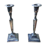 Pair of silver metal candle holders