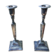 Pair of silver metal candle holders