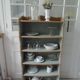 Small vintage bookcase, 5 fixed shelves, interior sublimated in verdigris, waxed finish.
