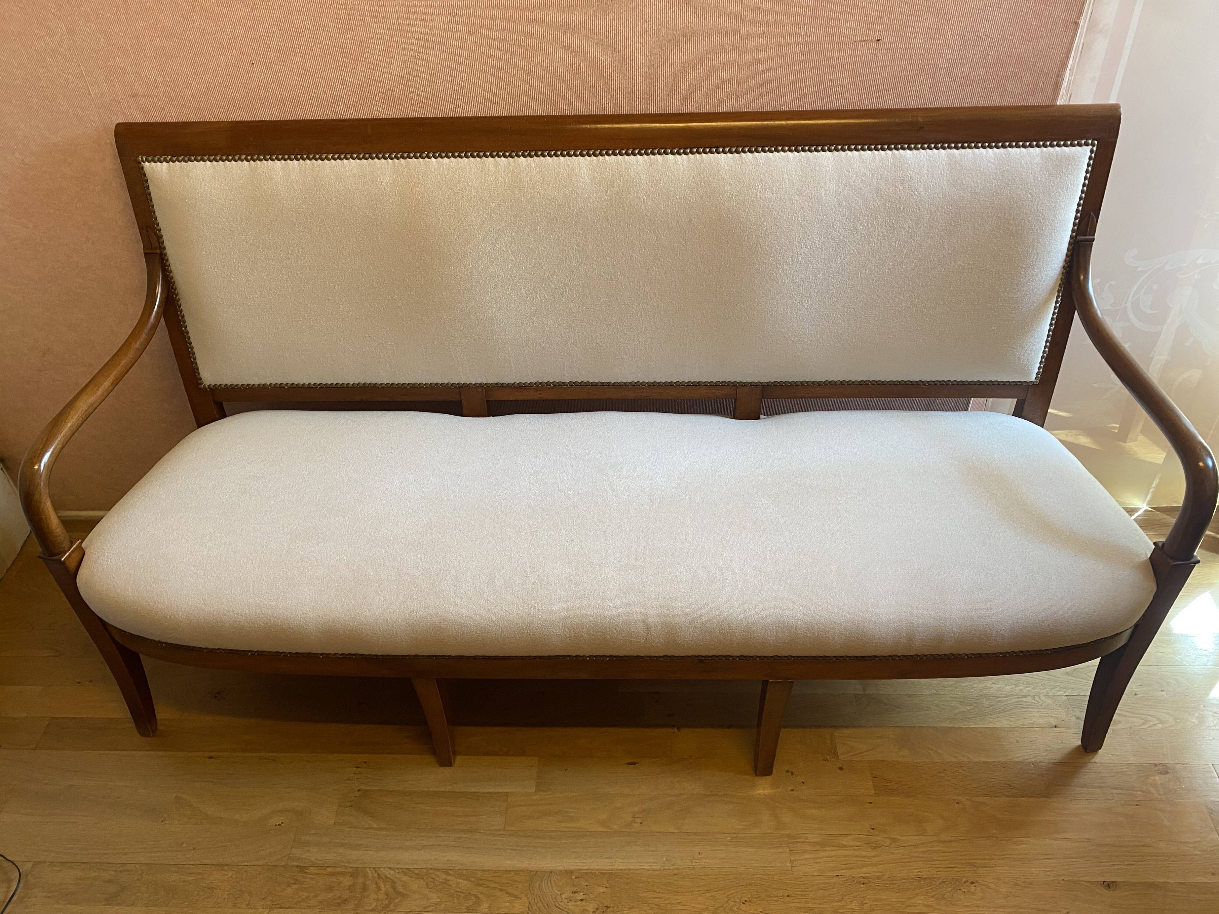 Walnut bench, from the restoration period, covered in white.