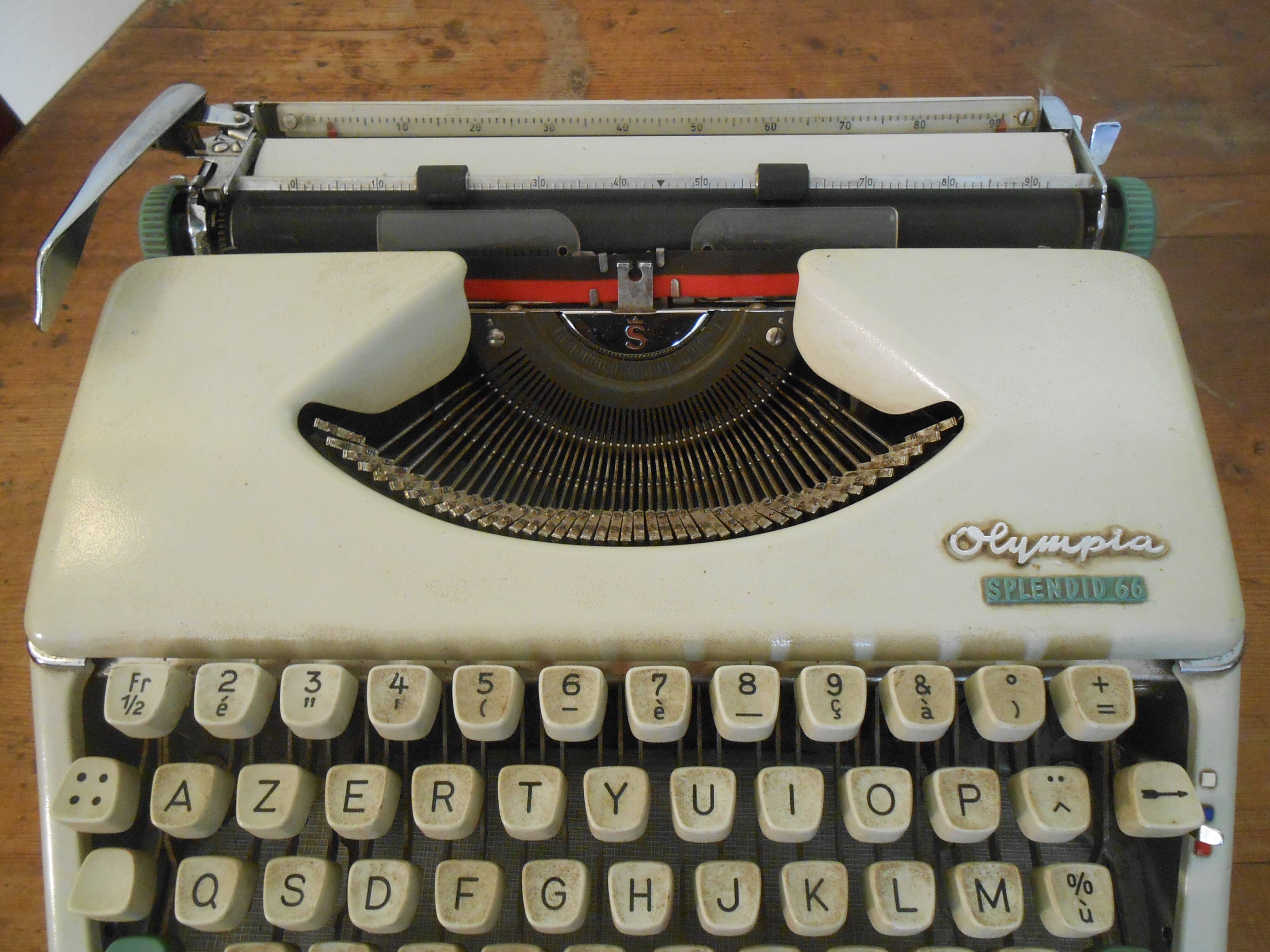 Typewriter Olympia 66, with cover